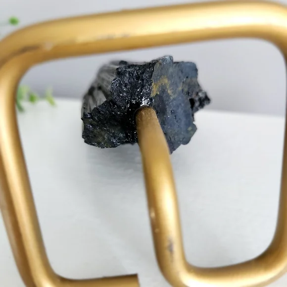Raw black tourmaline chunk on gold stand - crystal - Picture 7 of 10